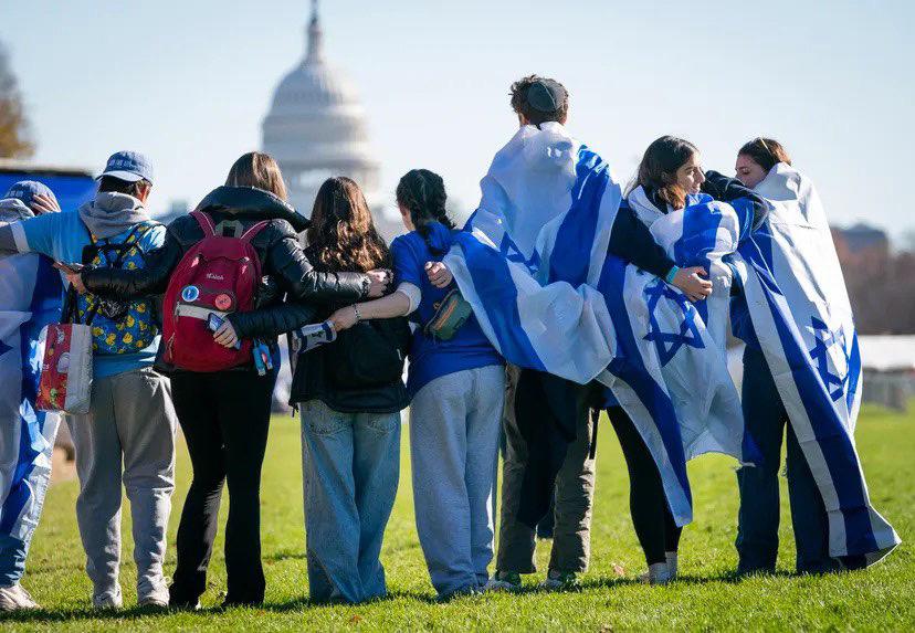 Group of people celebrating on stage