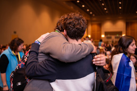 Group of people celebrating on stage