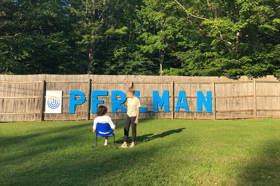 Group of people celebrating on stage