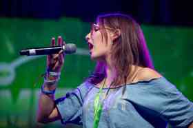 Group of people celebrating on stage