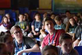 Group of people celebrating on stage