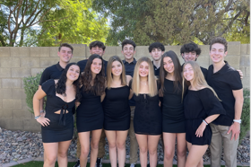 Group of people celebrating on stage