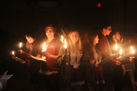 Group of people celebrating on stage