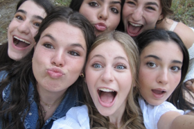 Group of people celebrating on stage