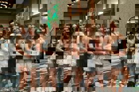 Group of people celebrating on stage