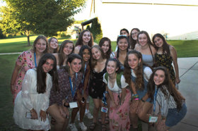 Group of people celebrating on stage