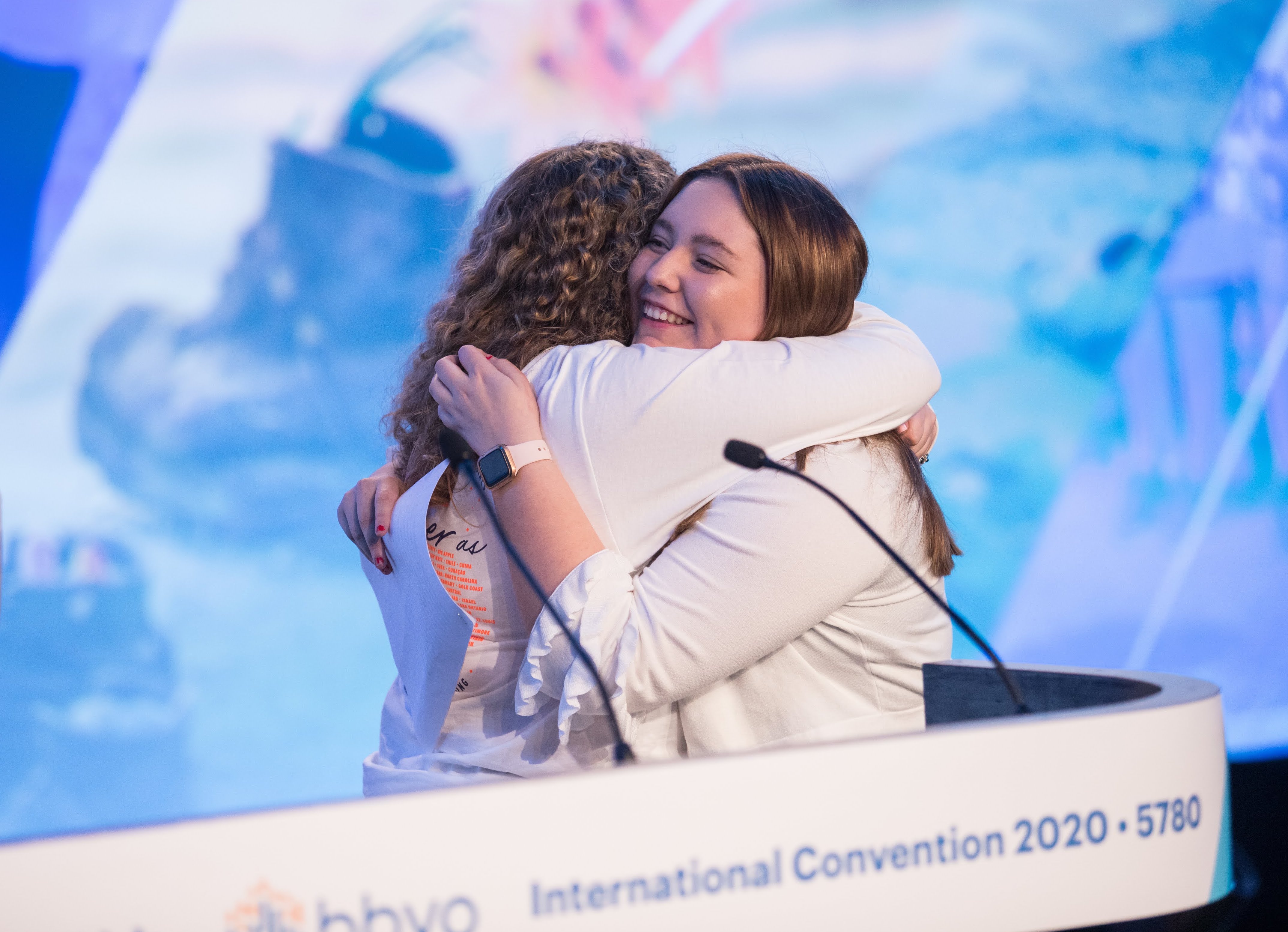 Group of people celebrating on stage