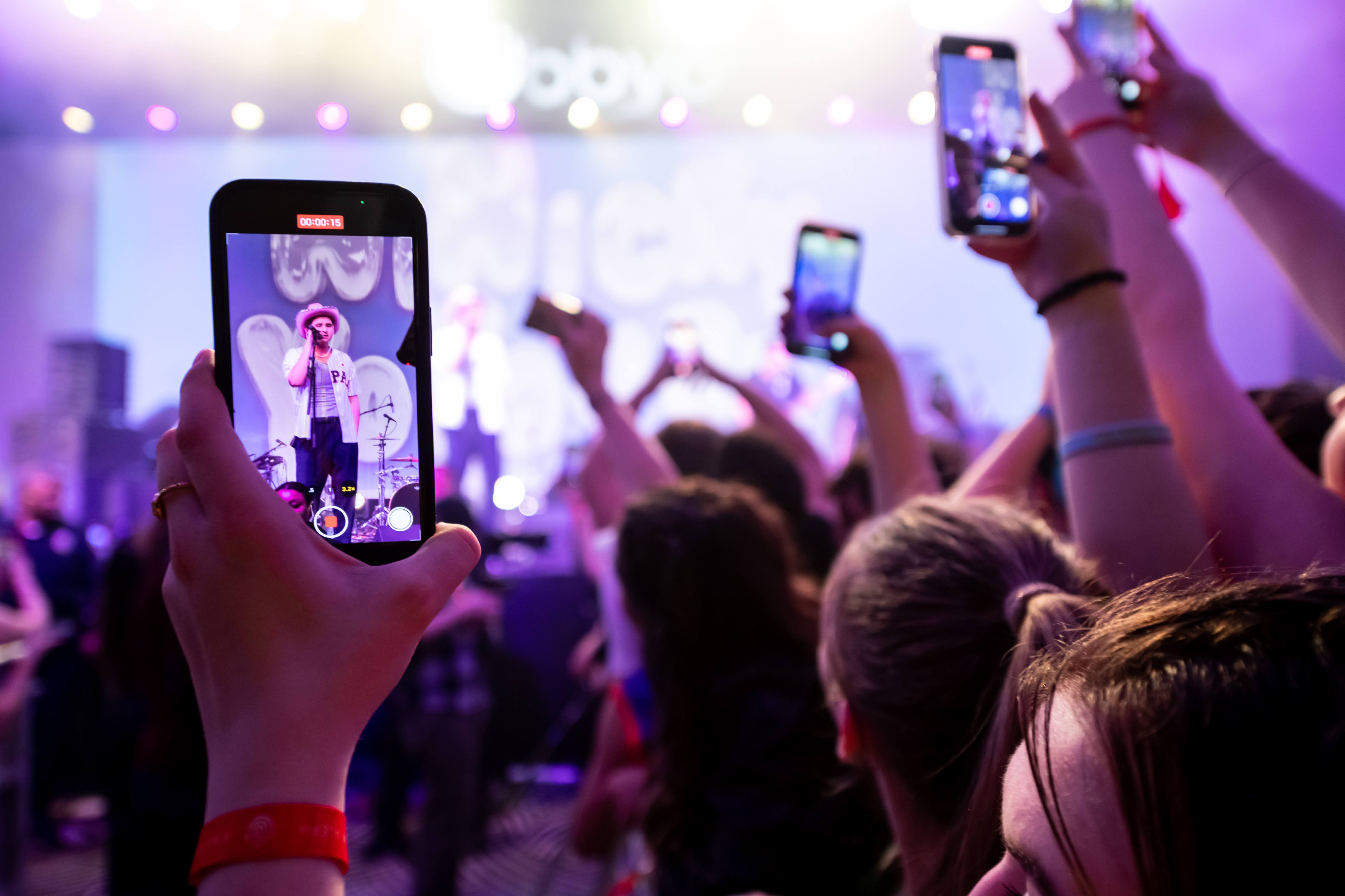 Group of people celebrating on stage