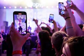 Group of people celebrating on stage
