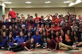 Group of people celebrating on stage