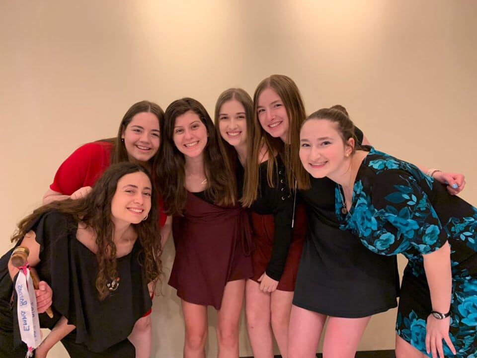 Group of people celebrating on stage