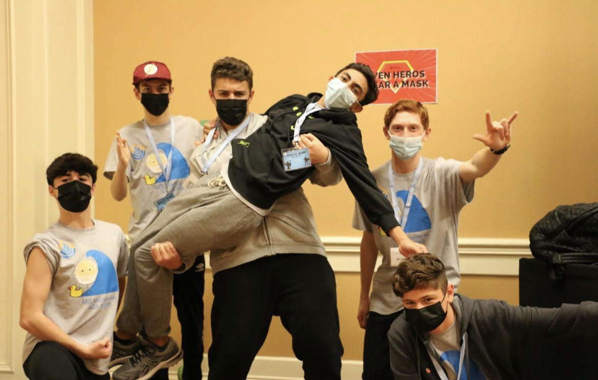 Group of people celebrating on stage