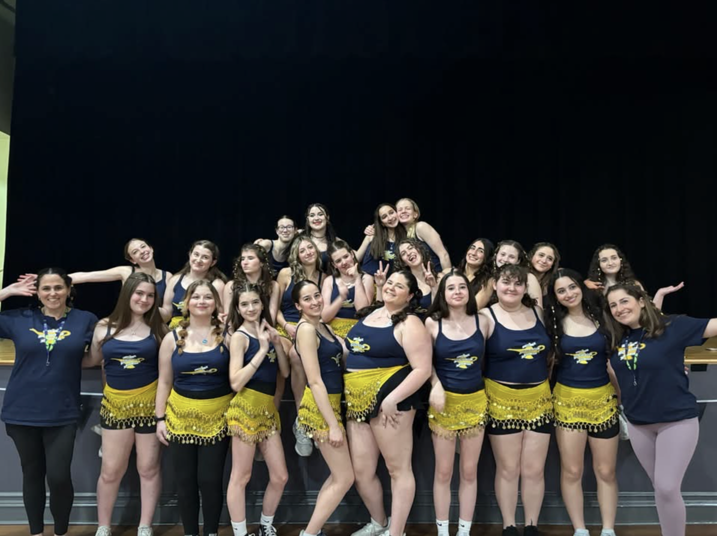 Group of people celebrating on stage