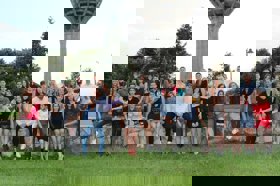 Group of people celebrating on stage