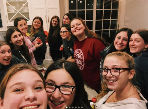 Group of people celebrating on stage