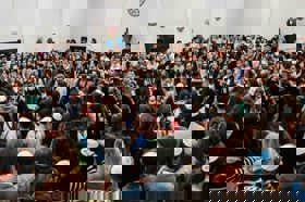 Group of people celebrating on stage