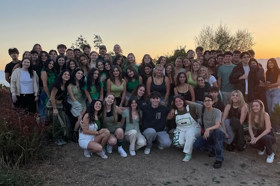 Group of people celebrating on stage