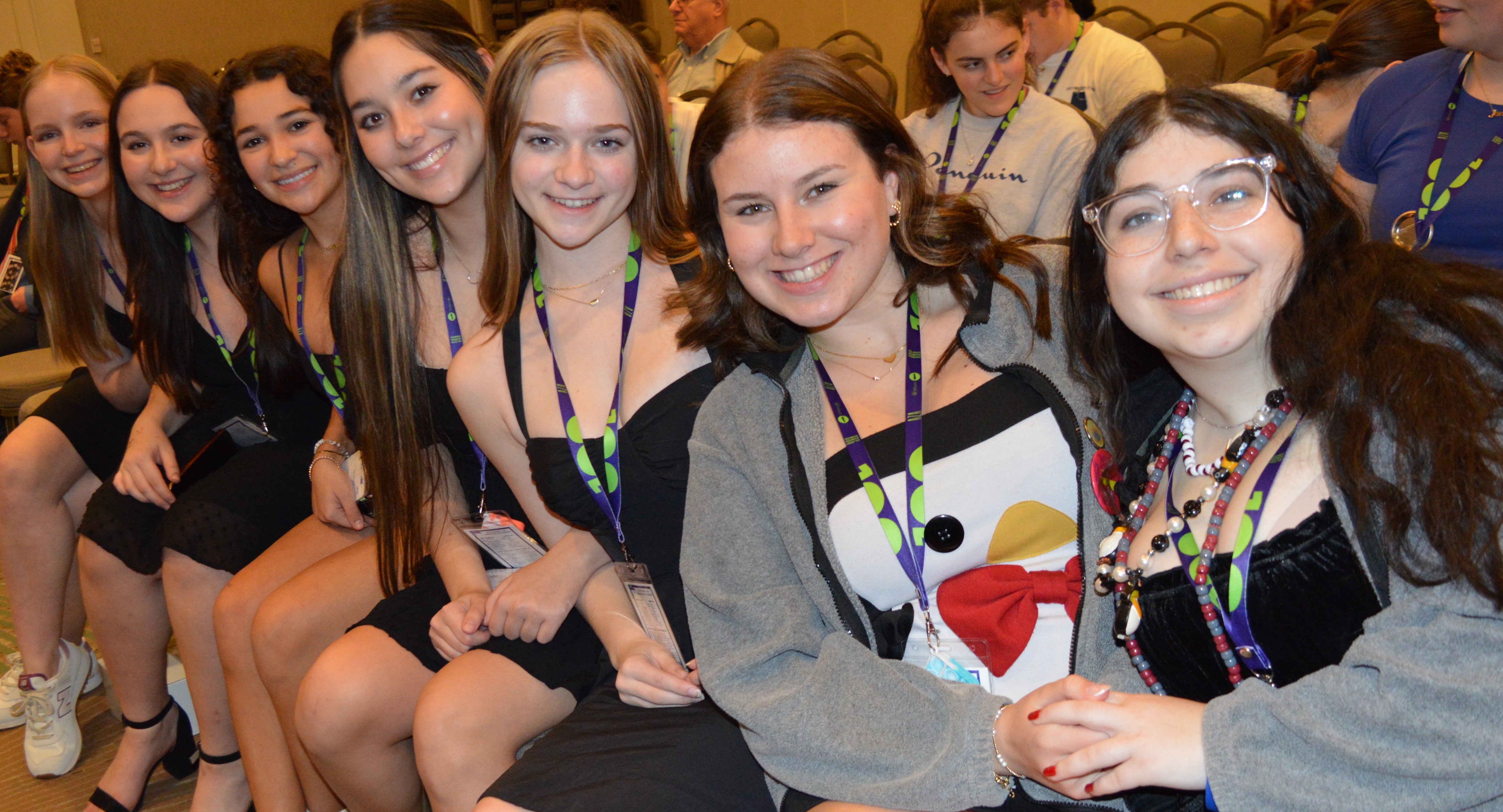 Group of people celebrating on stage