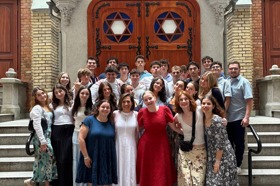 Group of people celebrating on stage