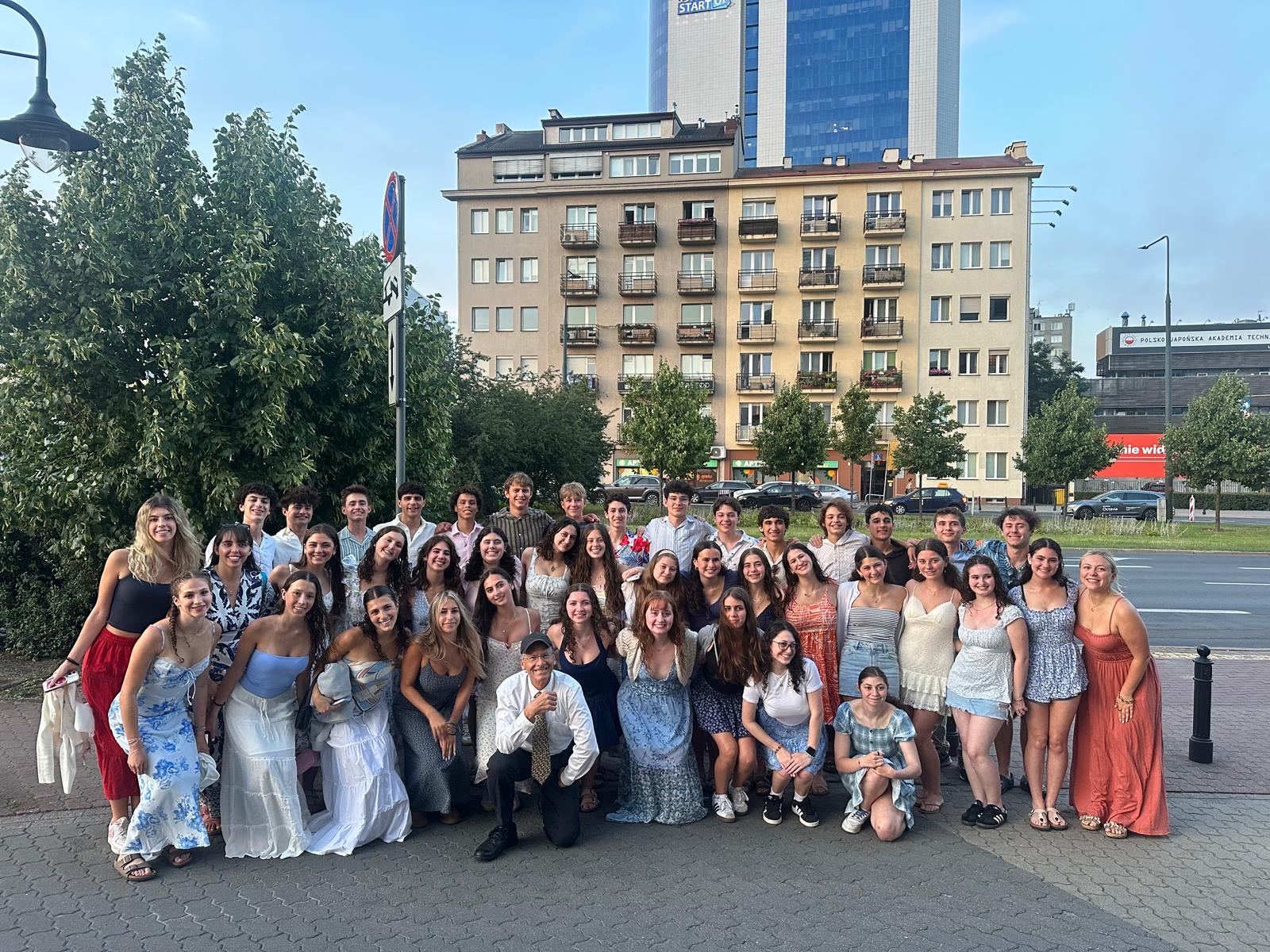 Group of people celebrating on stage