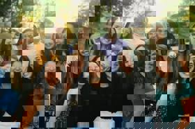 Group of people celebrating on stage