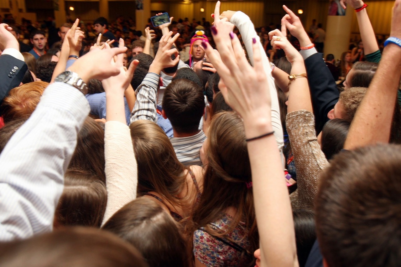 Group of people celebrating on stage