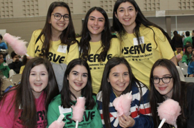 Group of people celebrating on stage