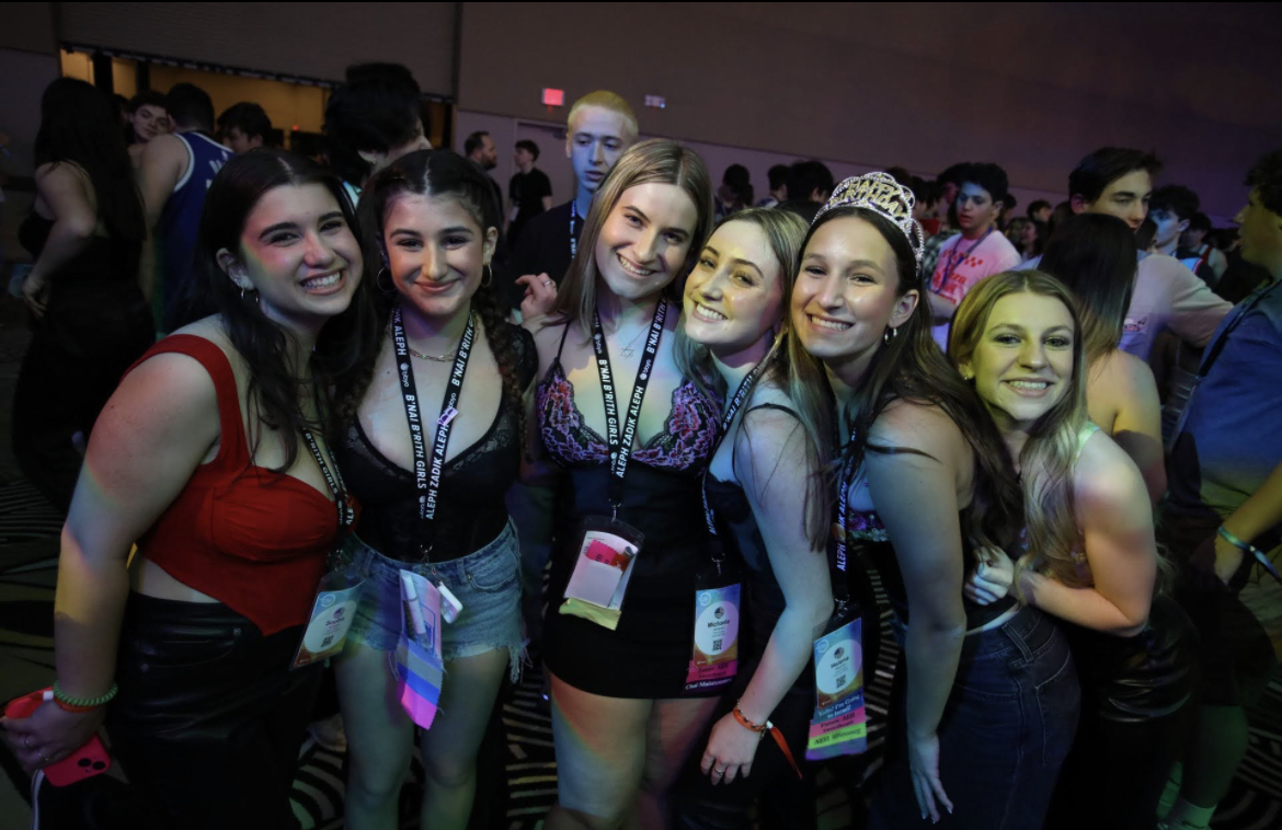 Group of people celebrating on stage