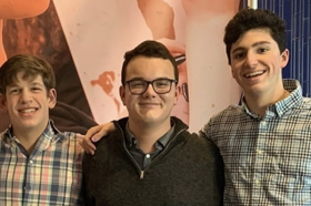 Group of people celebrating on stage