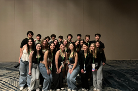 Group of people celebrating on stage