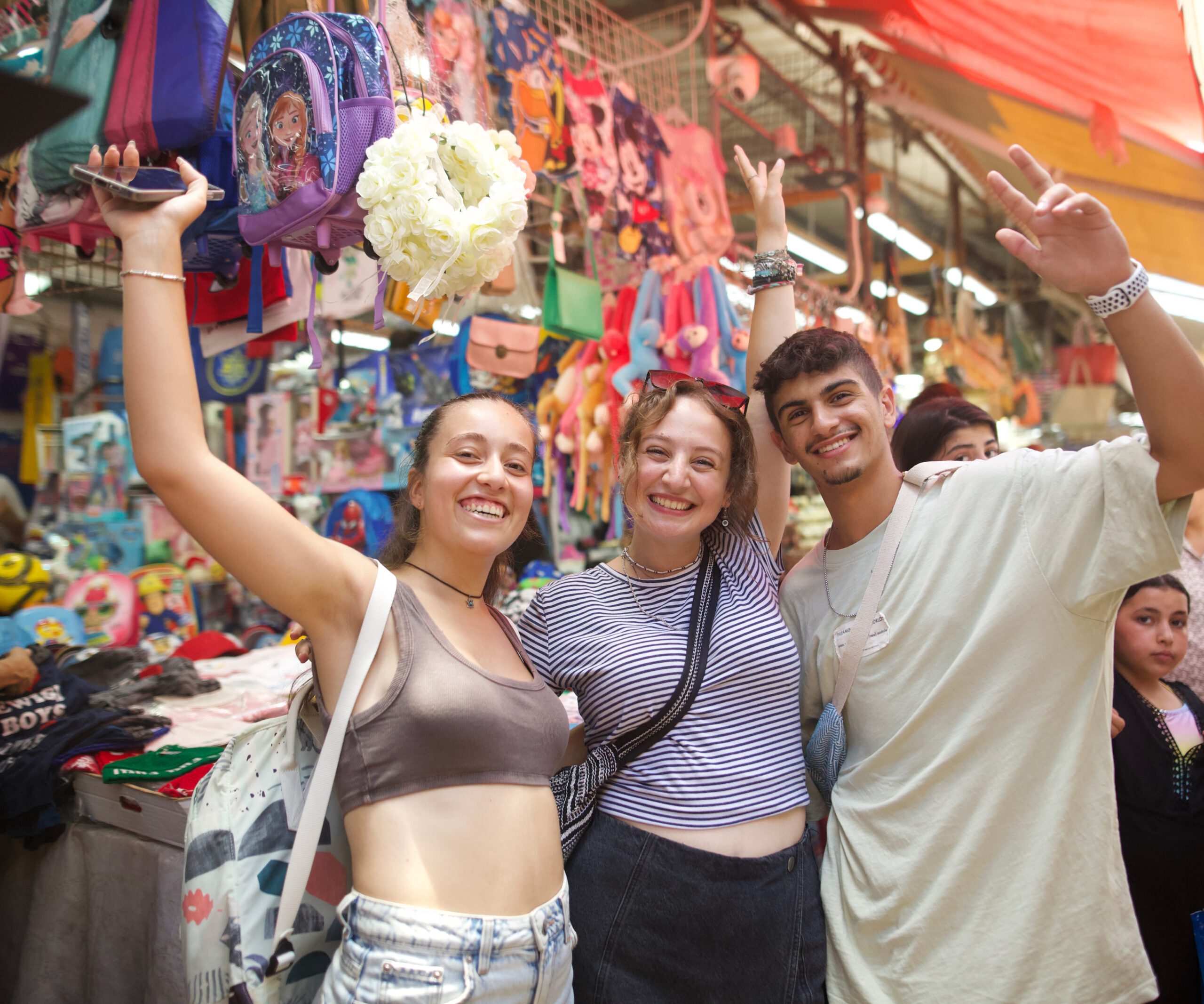 Group of people smiling outdoors