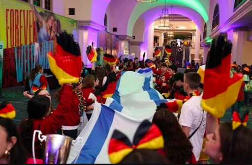 Group of people celebrating on stage