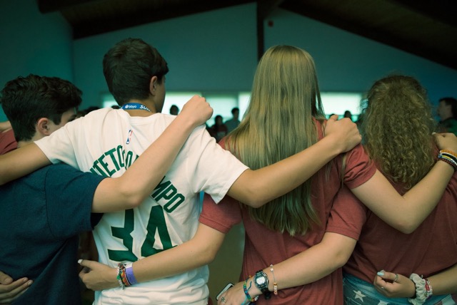 Group of people celebrating on stage