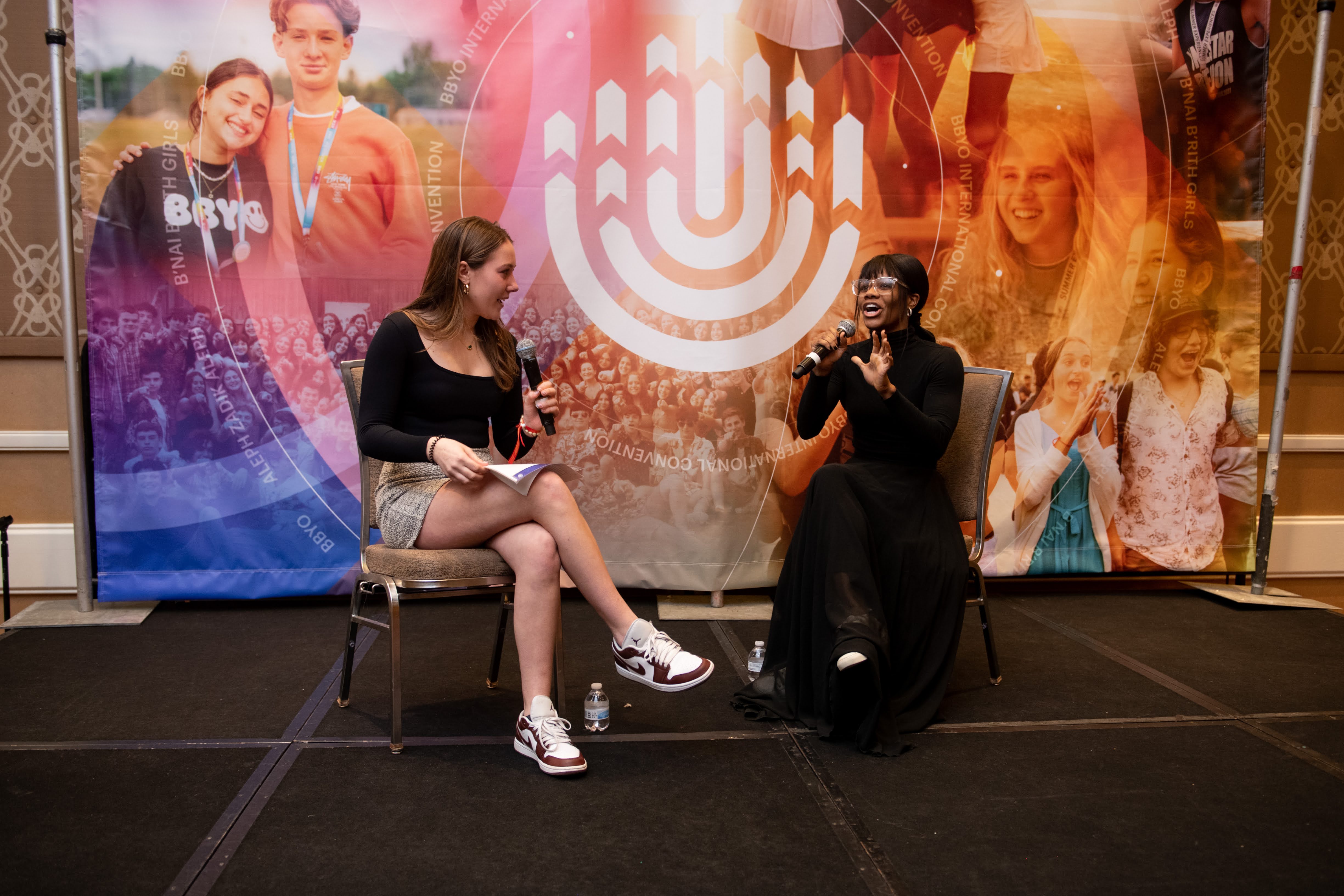Group of people celebrating on stage
