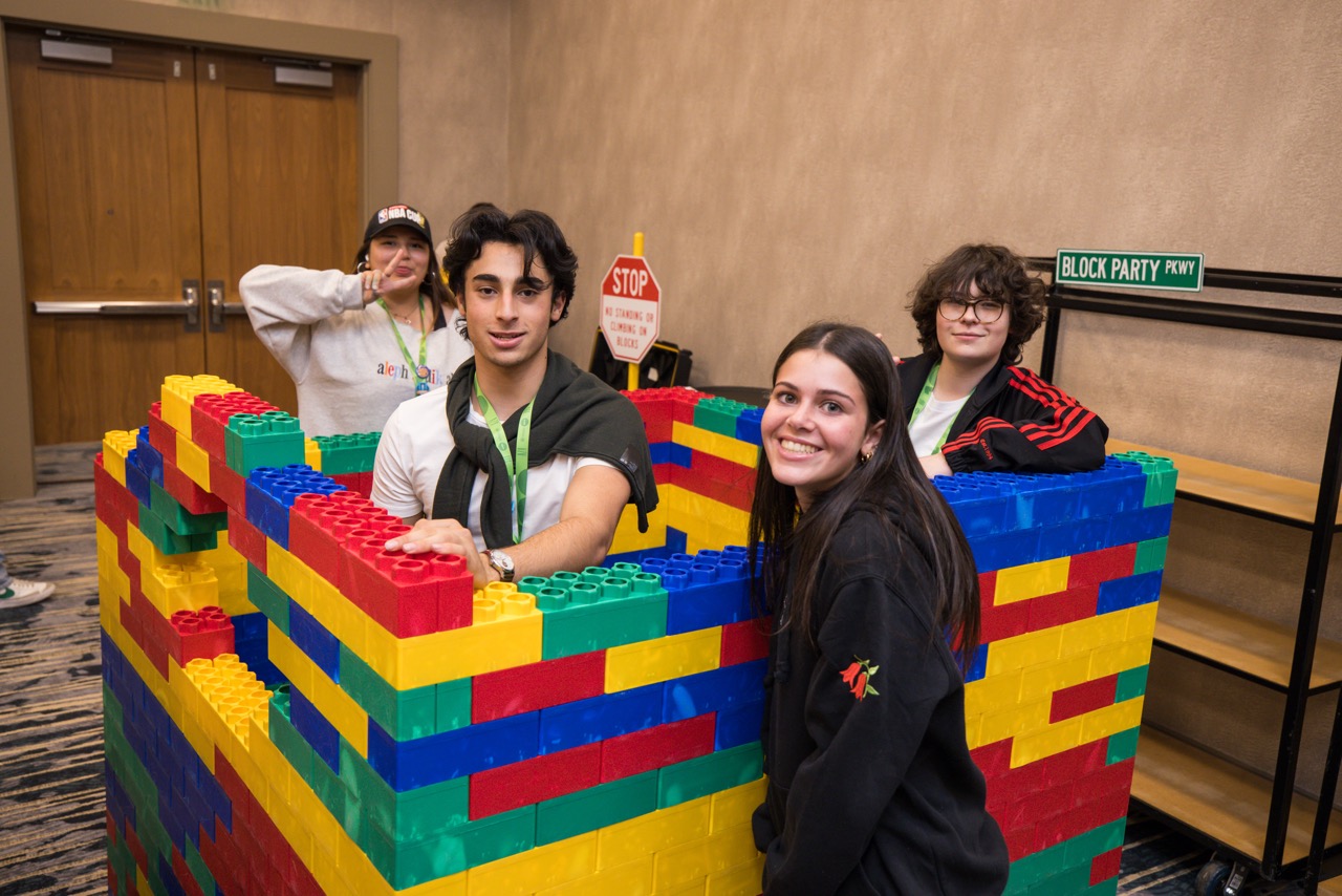 Group of people celebrating on stage