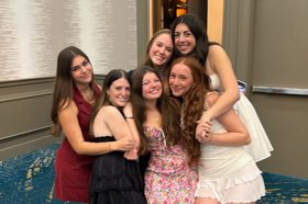 Group of people celebrating on stage