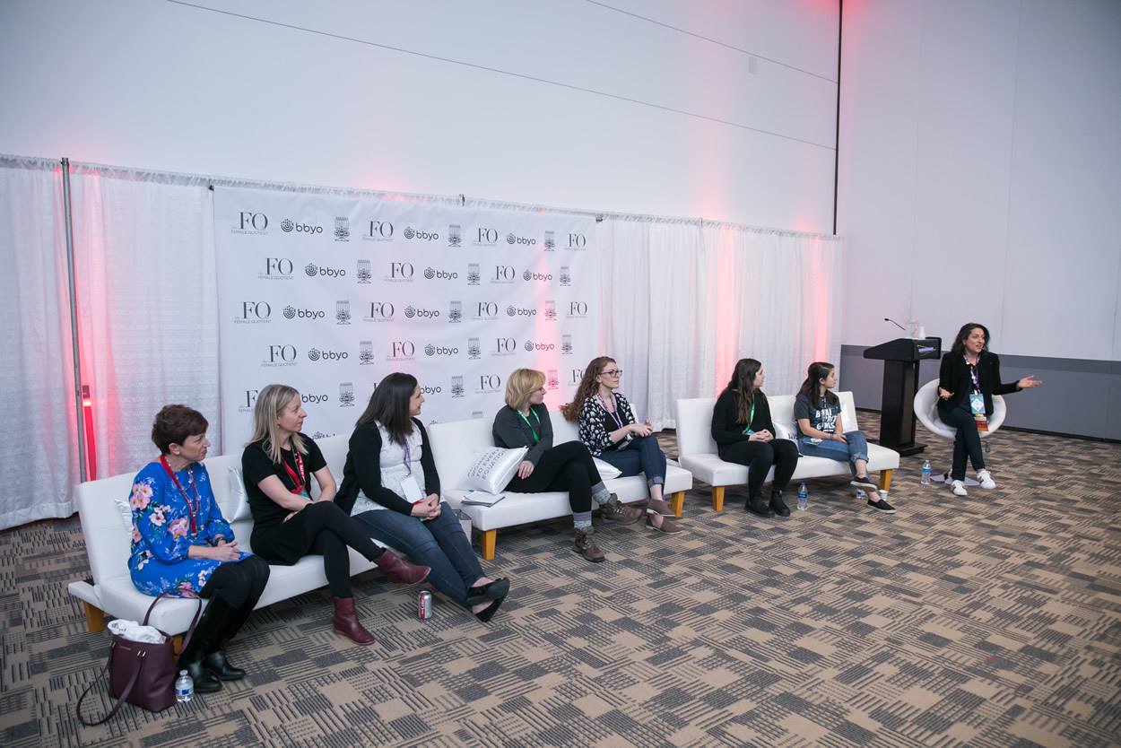 Group of people celebrating on stage