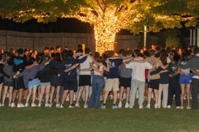 Group of people celebrating on stage