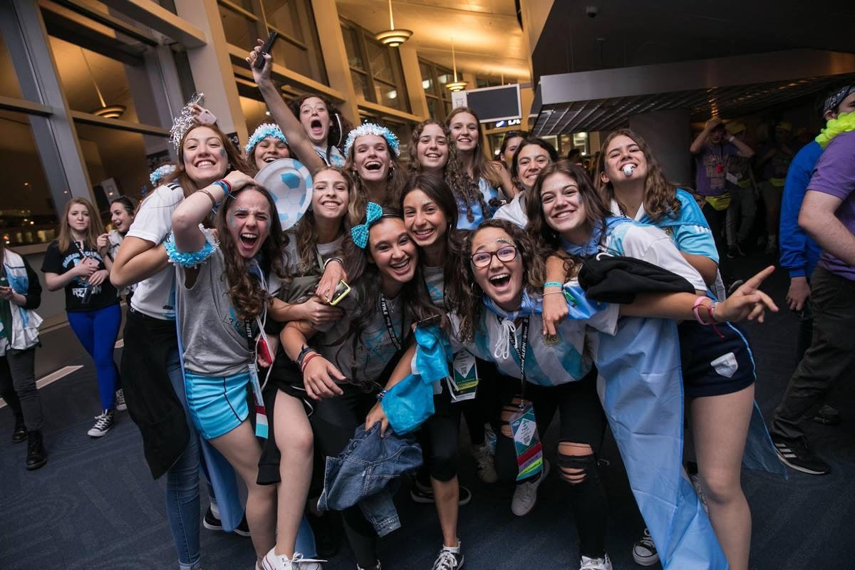 Group of people celebrating on stage