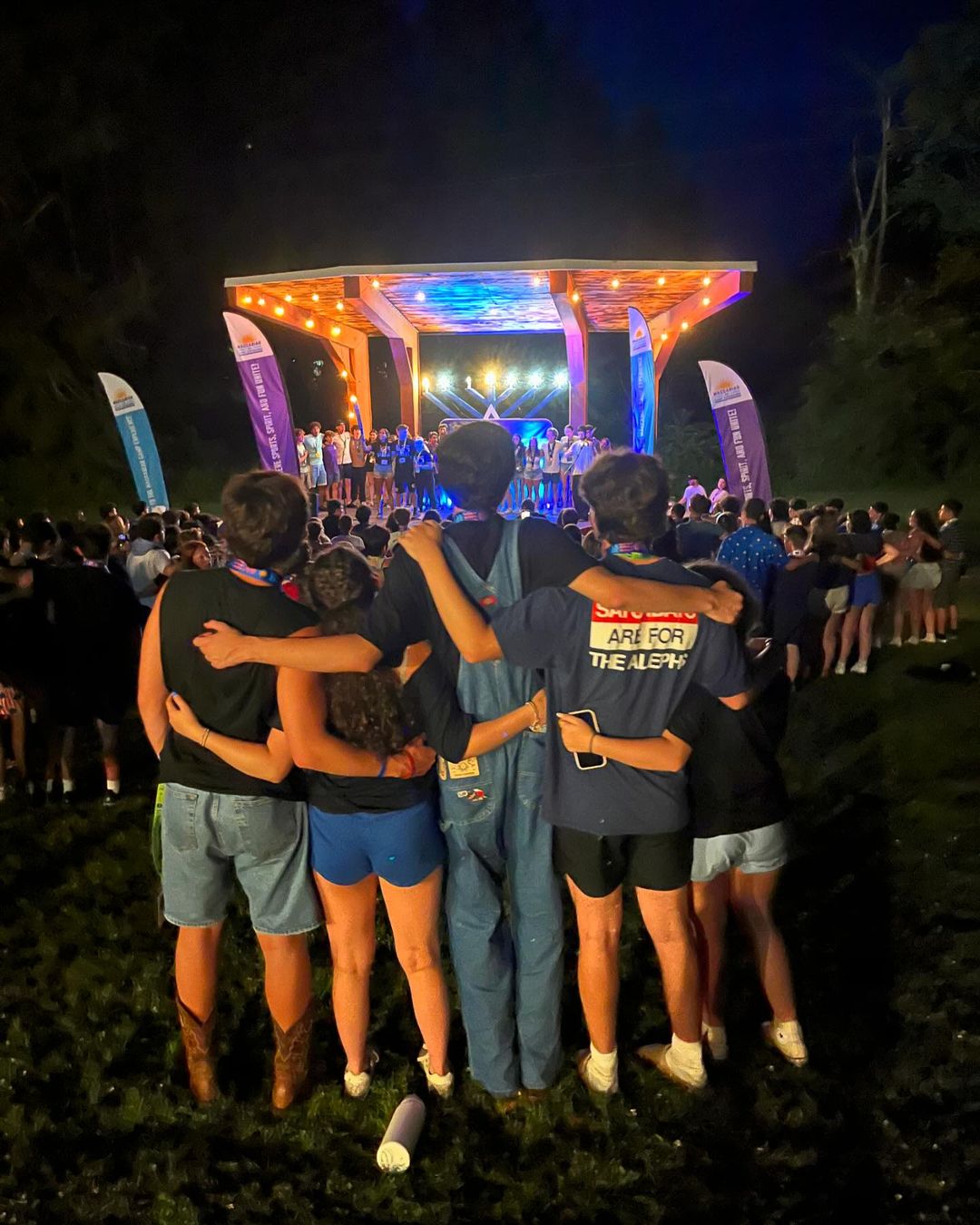 Group of people celebrating on stage
