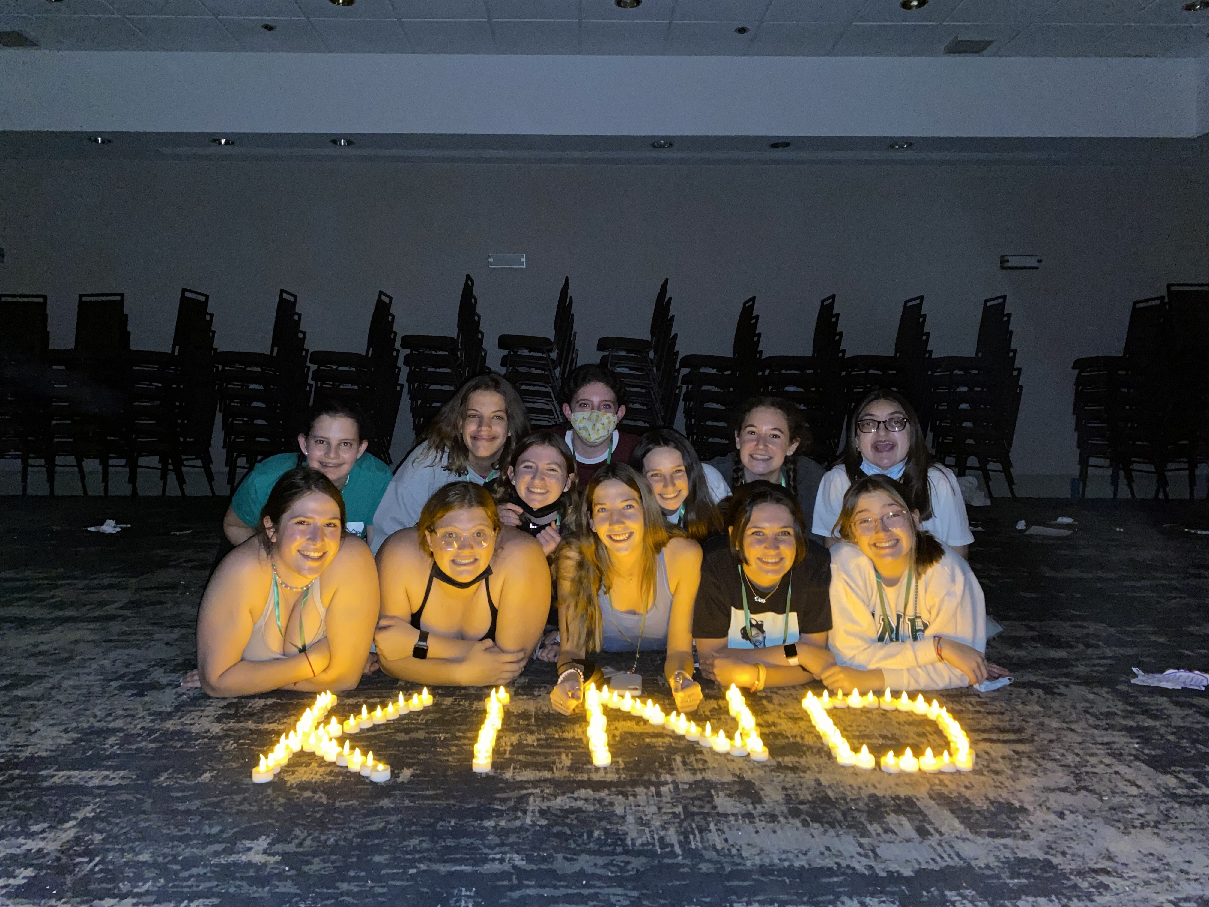 Group of people celebrating on stage