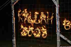 Group of people celebrating on stage