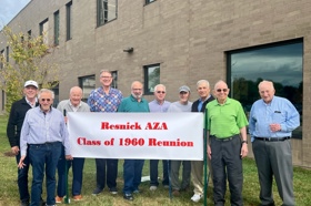 Group of people celebrating on stage