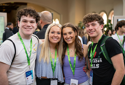 Students enjoying a summer program, standing together with name badges