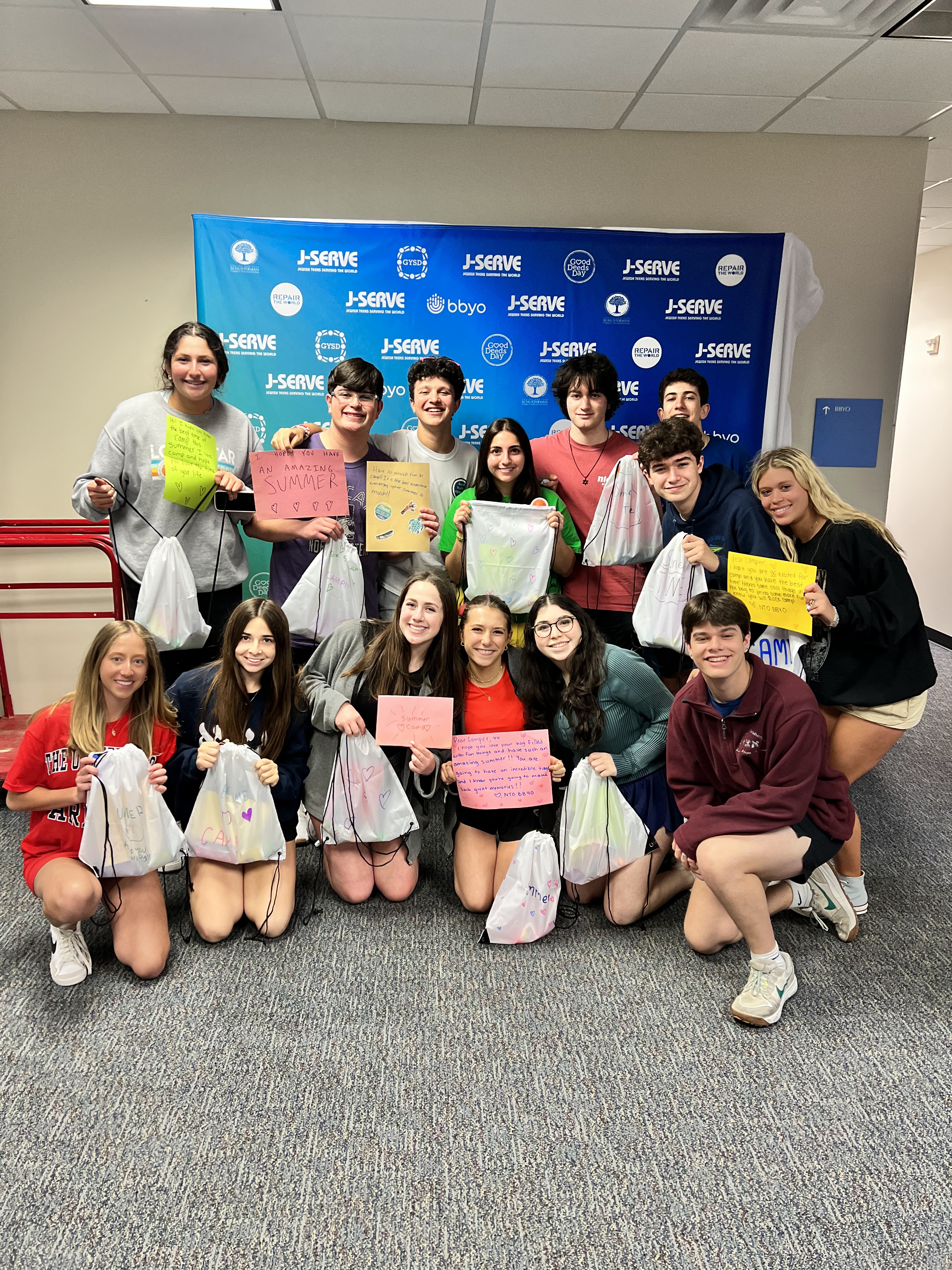 Group of people celebrating on stage