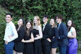 Group of people celebrating on stage