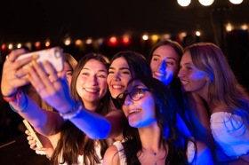 Group of people celebrating on stage
