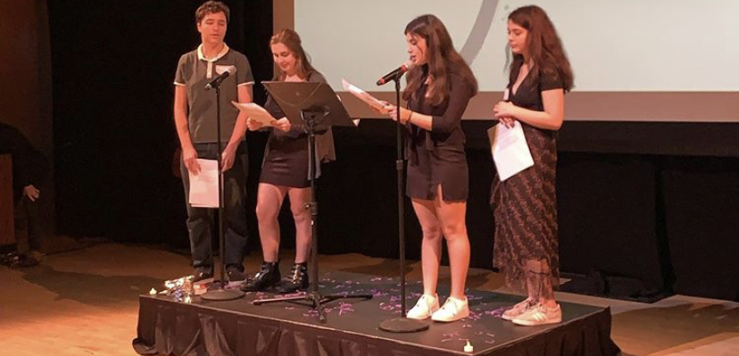 Group of people celebrating on stage