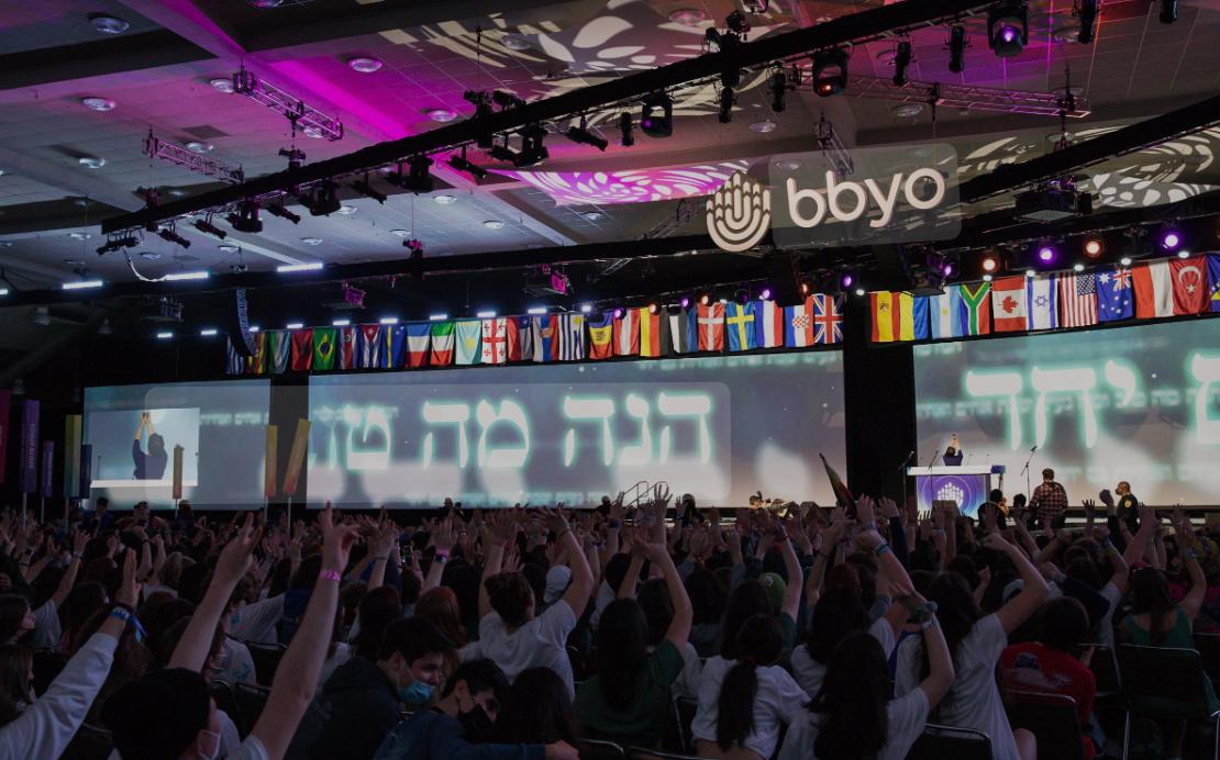Group of people celebrating on stage