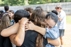 Group of people celebrating on stage